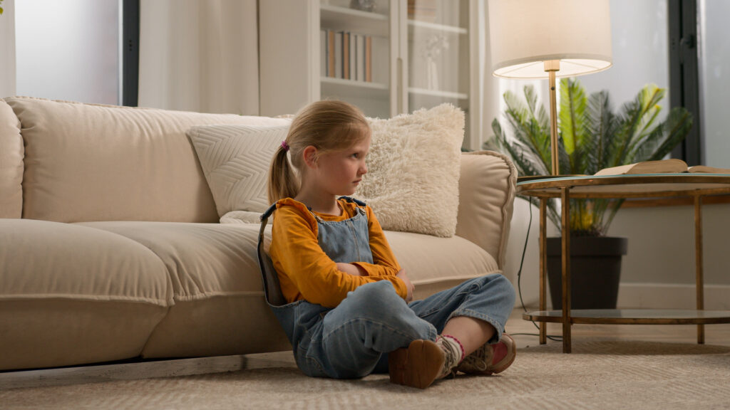 Upset unhappy offended preschool caucasian little kid girl feeling sad alone bullied abused abandoned child stressed sitting on floor at home children problem domestic violence family conflict concept