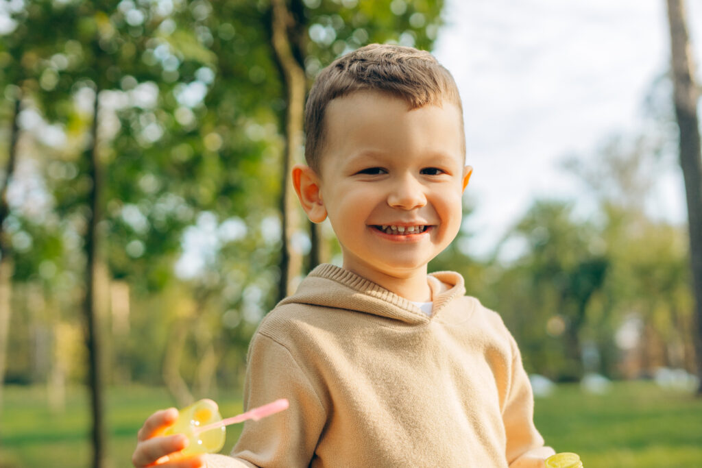 little boy smiling